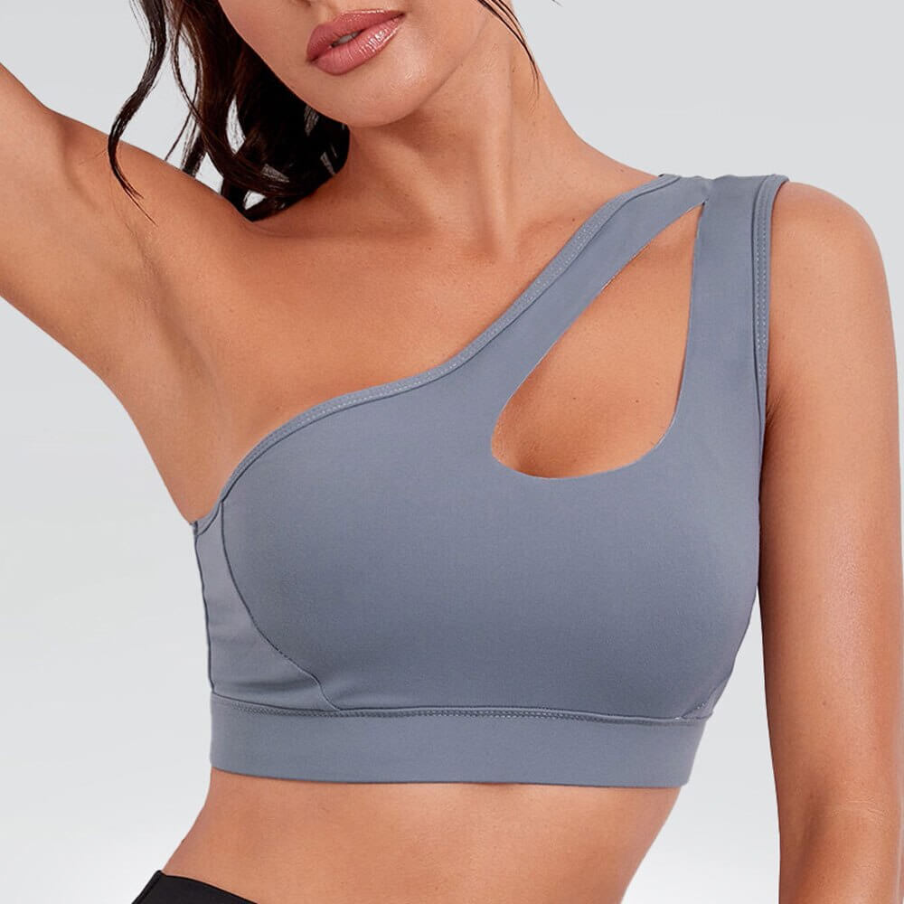 Stylish one-shoulder women's sports bra in gray; perfect for fitness, running, and cycling. Made with breathable spandex and nylon.
